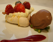 Photo  C. Saenkhamlue & Co KB --- Chocolate ice cream with wild berry meringue and caramel